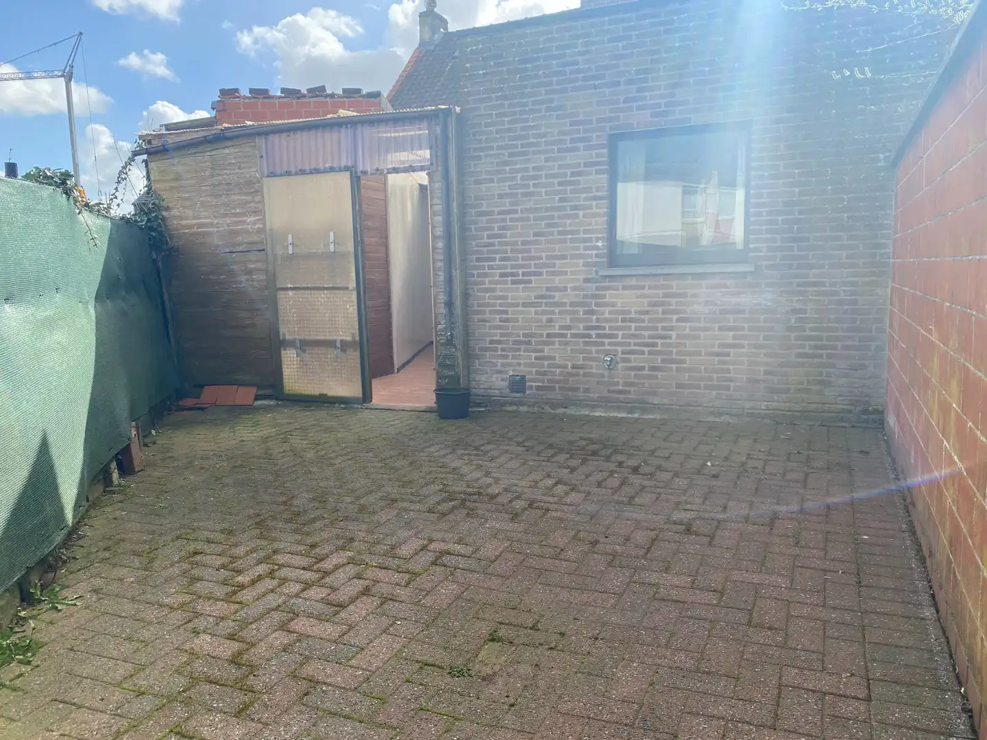 Charmante rijwoning met 2 slpk en koer foto 6