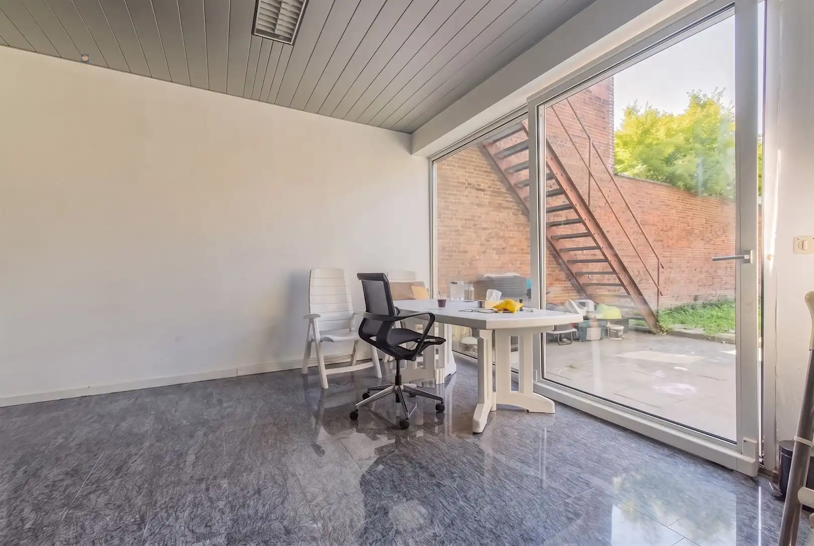 Opbrengsteigendom met handelsruimte en verhuurd duplex appartement in het centrum van Willebroek foto 6