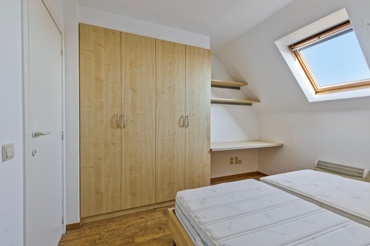 Ruim appartement met drie slaapkamers, twee terrassen en parking te koop! foto 7