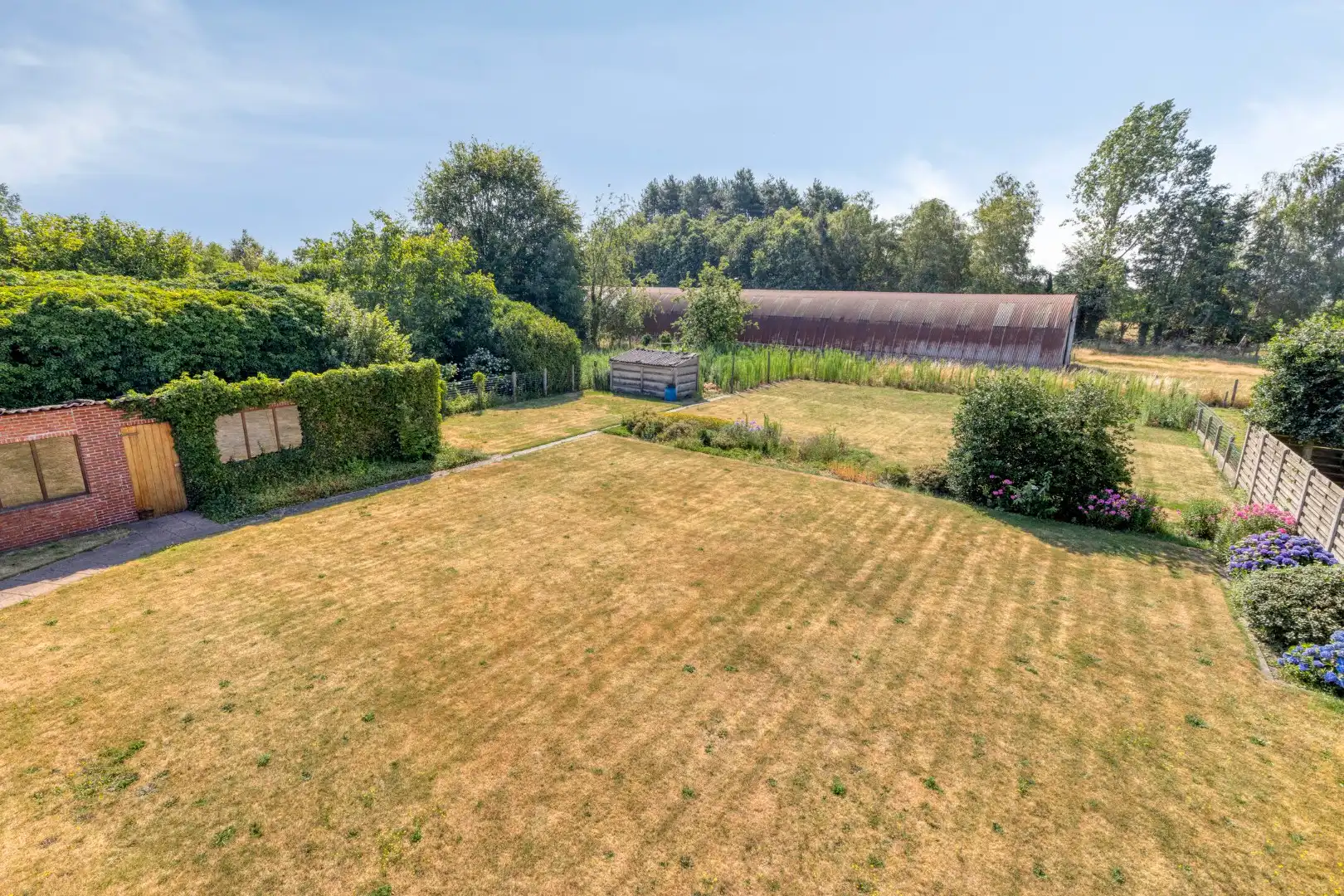 Op te frissen woning met 4 slpks, op een zonnig perceel van 1.506 m² in Mol-Achterbos !  foto 28