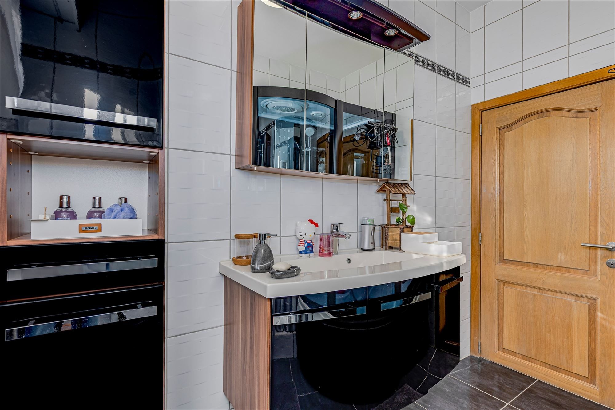 Mooi ingerichte woning met 4 slk, 2 badk en ruime stadstuin in Merksem foto 21