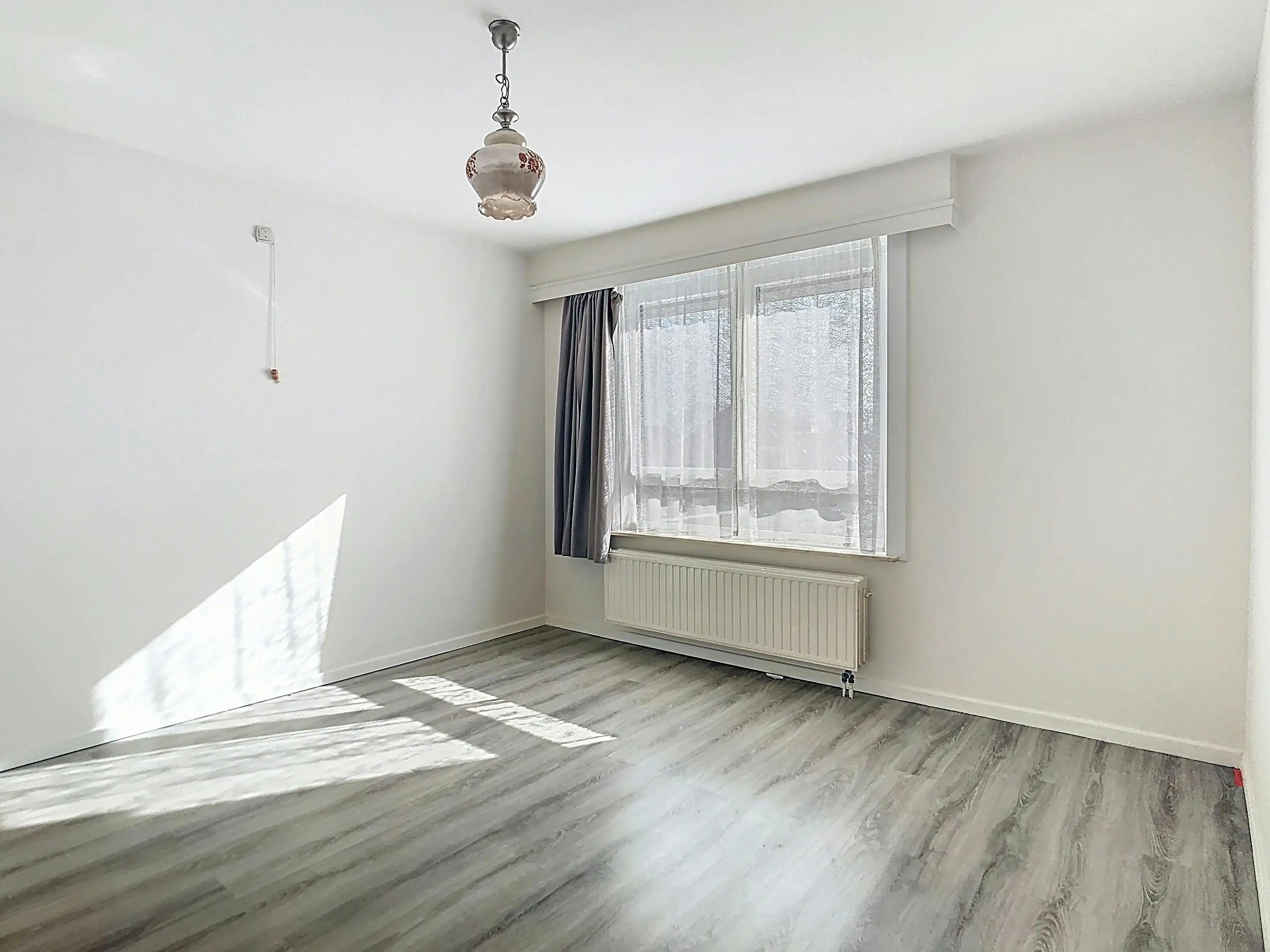 Gemoderniseerd appartement met 2 slpkmrs (garage mogelijk) foto 10