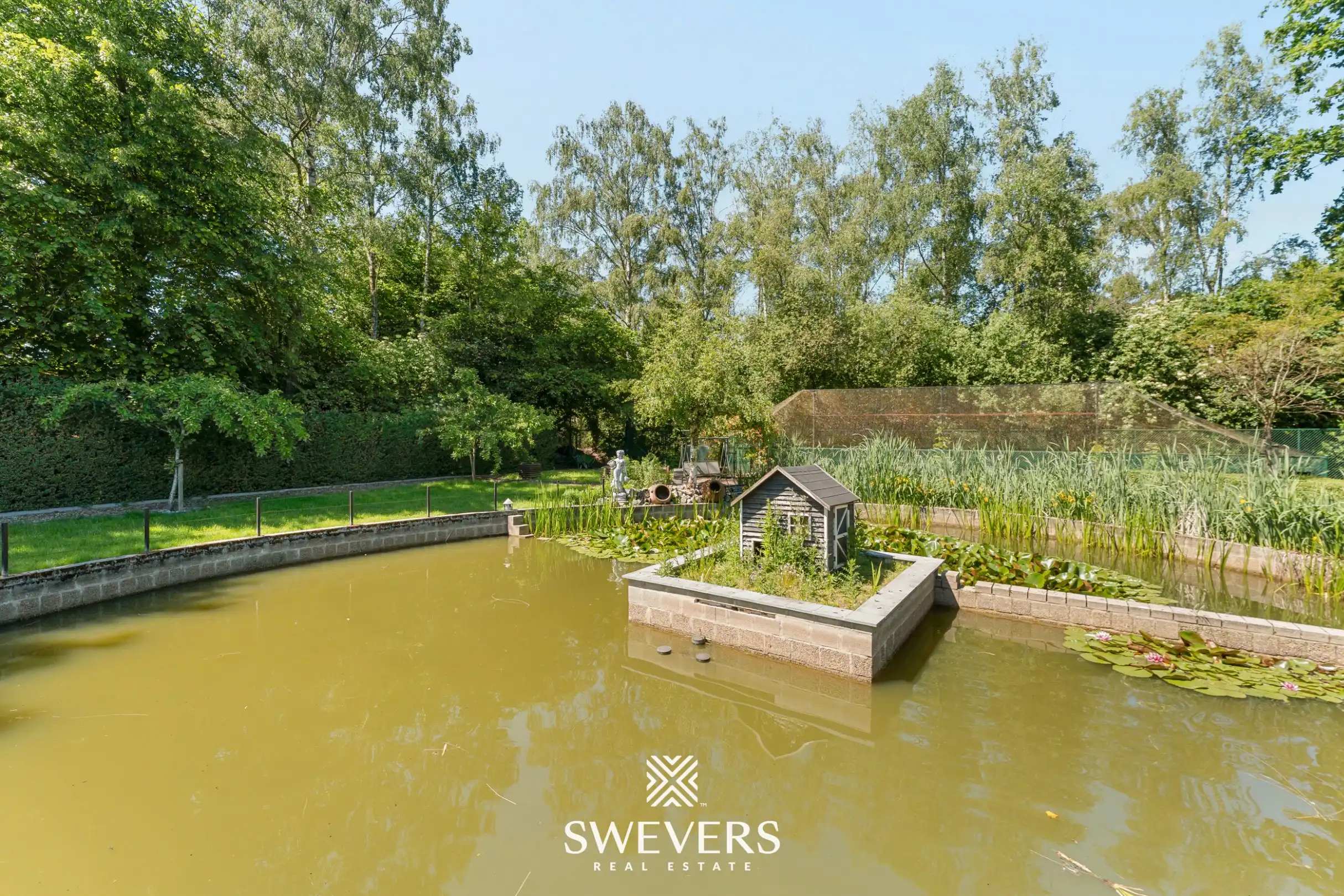 Instapklare open bebouwing met ruime tuin en chalet op 2.364 m² in Houthalen-Helchteren foto 20