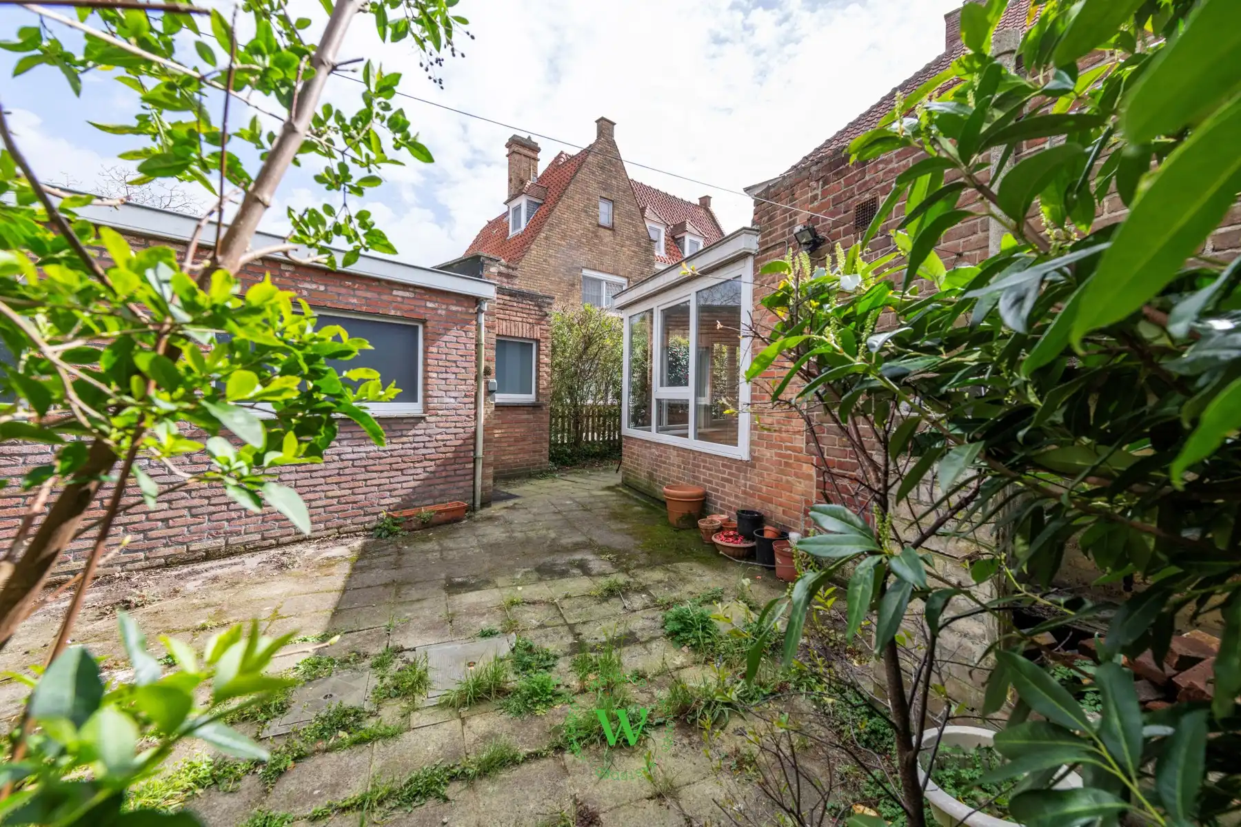 Verrassende en charmante halfopen bebouwing te Assebroek. foto 29