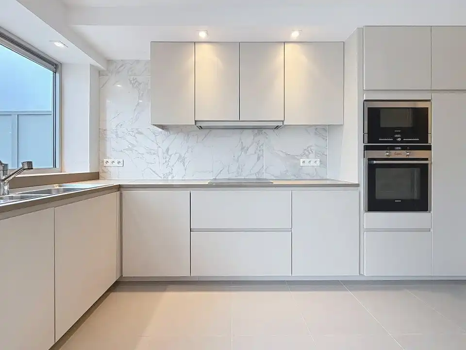 Volledig gerenoveerd, energiezuinig appartement met garage op de 5de verdieping foto 4