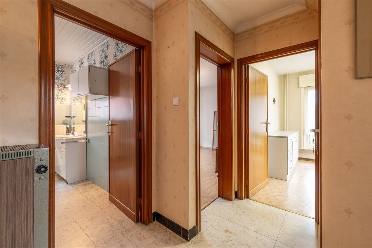 Te renoveren woning met 4 slk. in het hart van Averbode foto 13