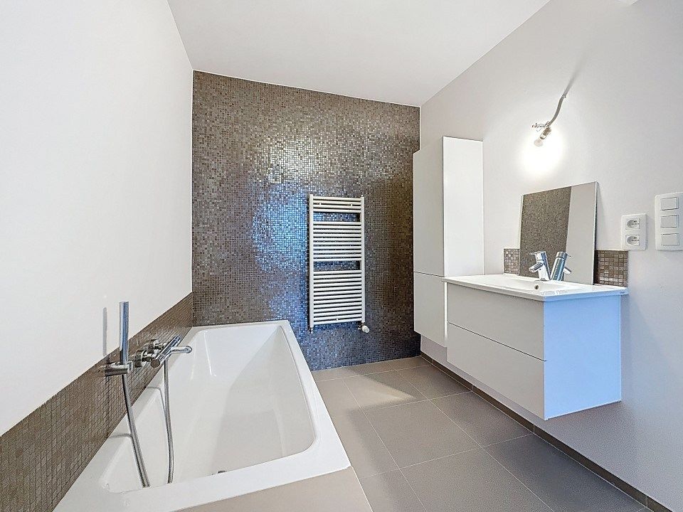 Volledig gerenoveerd, energiezuinig appartement met garage op de 5de verdieping foto 6