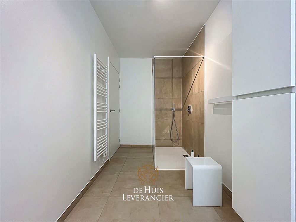 Discrete luxe & tijdloze elegantie : subliem nieuwbouwappartement met terras en gemeenschappelijk tuin te koop in Boechout foto 11