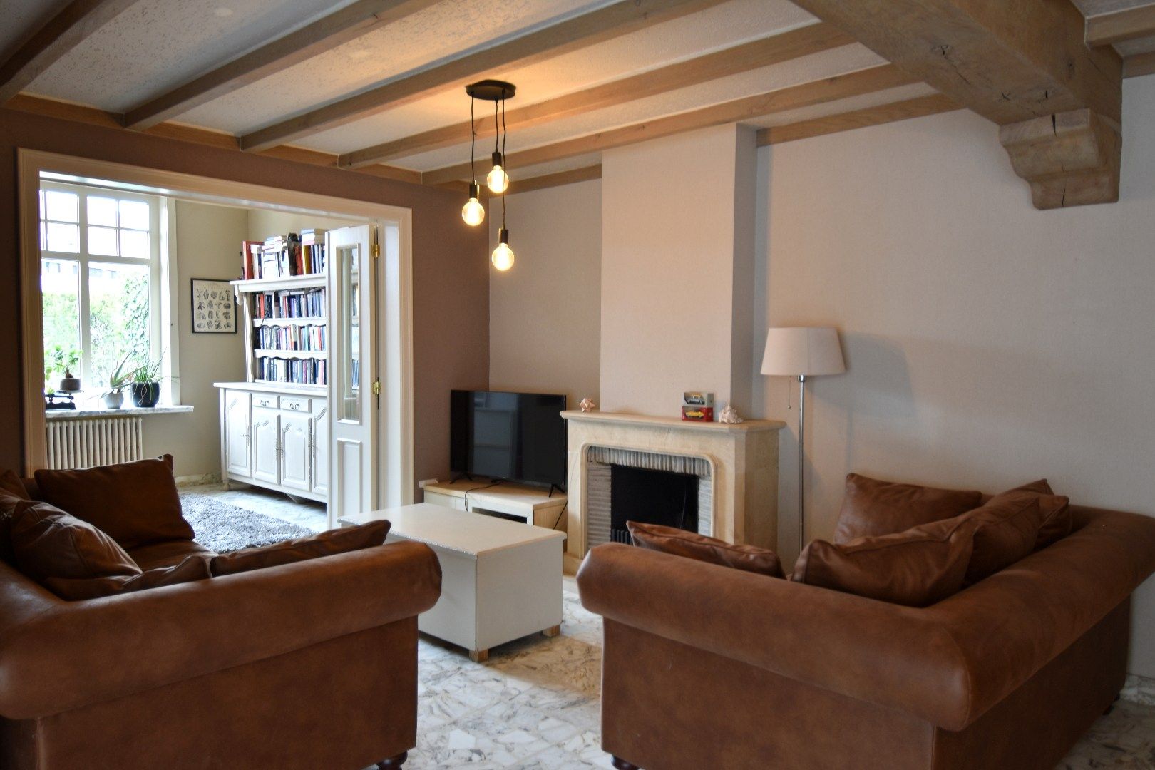 Charmante alleenstaande woning met 3 slaapkamers, tuin en garage in een rustige straat te Rollegem foto 3