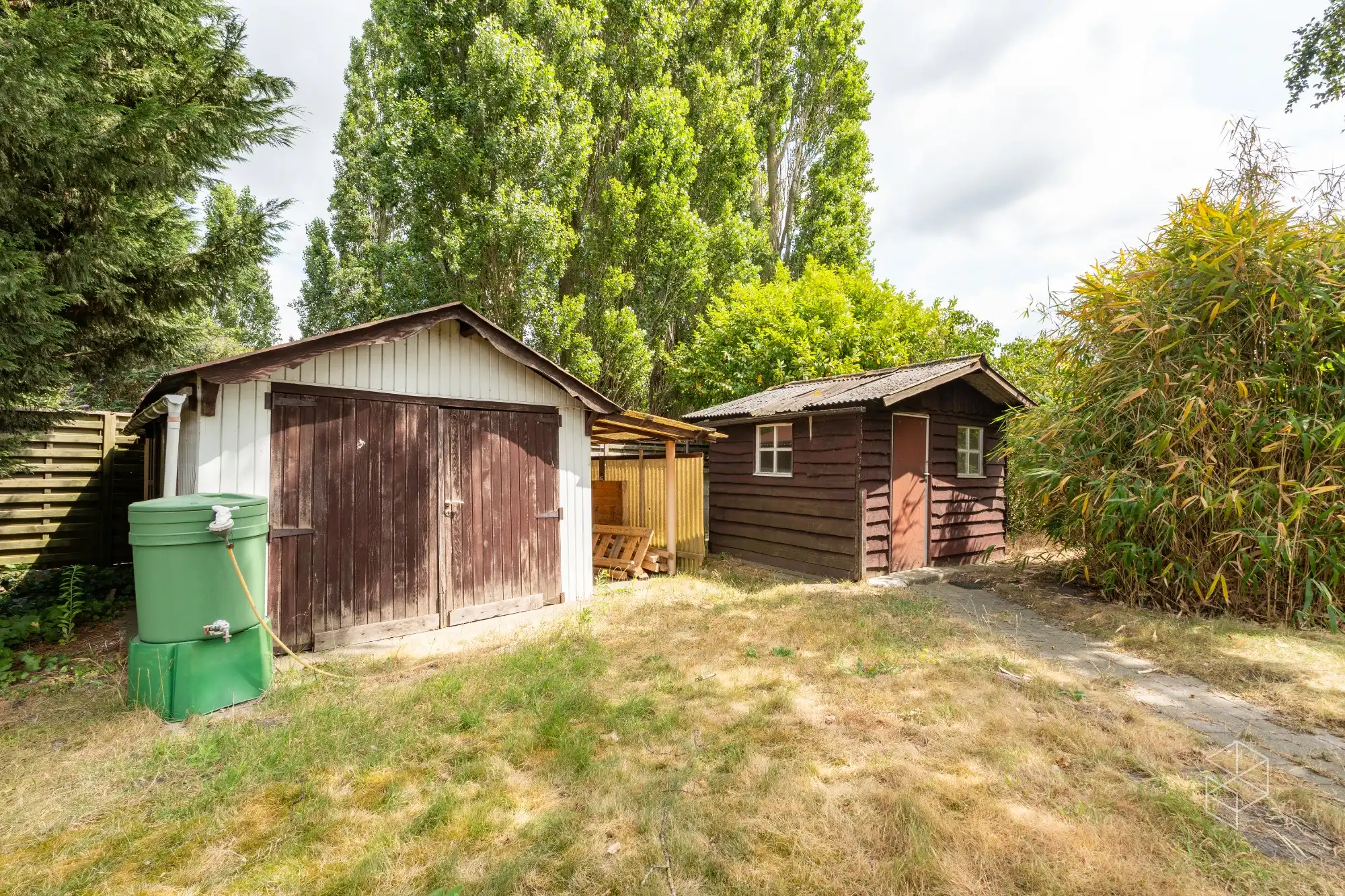 Centraal gelegen gelijkvloerse woning met royale tuin op 1636m² foto 21