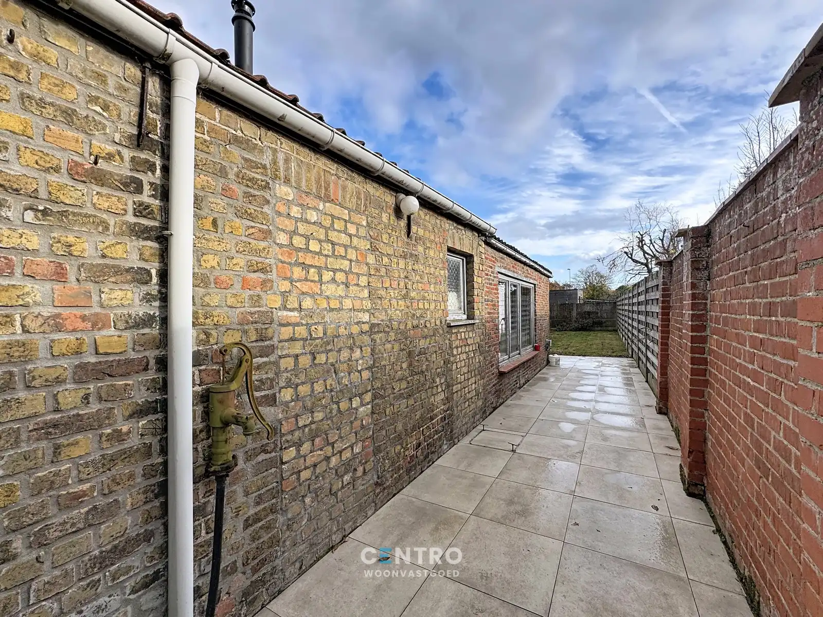 Op te frissen woning met 4 slpks én ZUIDger. tuin te Assebroek! foto 17