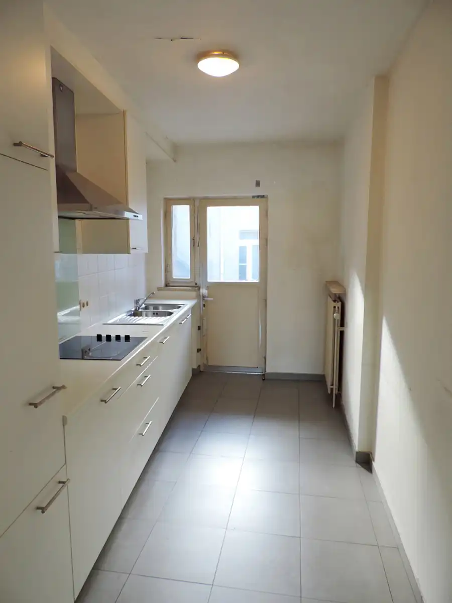 Opbrengsteigendom met handelsgelijkvloers en 2 appartementen foto 7