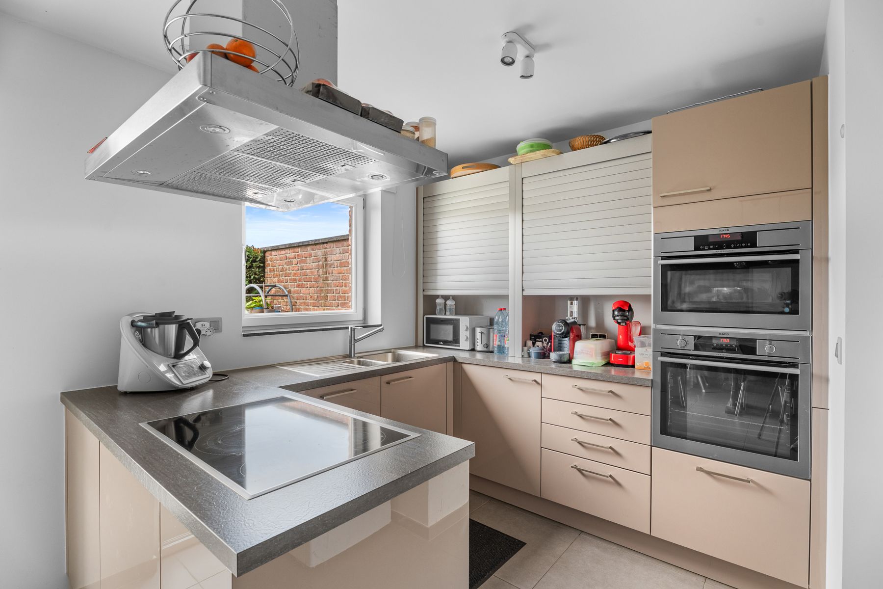 Gelijkvloers appartement met tuin en garage in Astene. foto 4