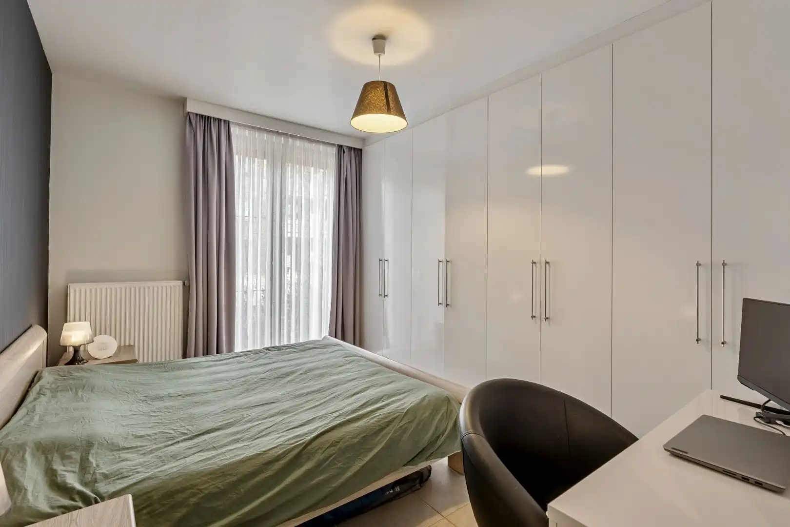 Gelijkvloers appartement (105m²), 2 slpk, tuin/terras, autostaanplaats + kelderberging foto 11