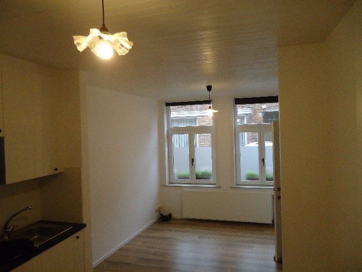 Goed gelegen gelijkvloers appartement foto 3