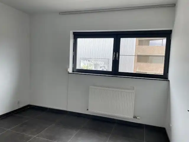 Appartement met 2 slaapkamers, ruim terras en parking foto 7