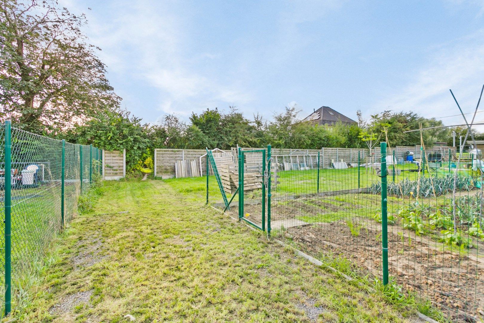 Instapklare woning met 2 slaapkamers en grote, zuidgerichte tuin! foto 17