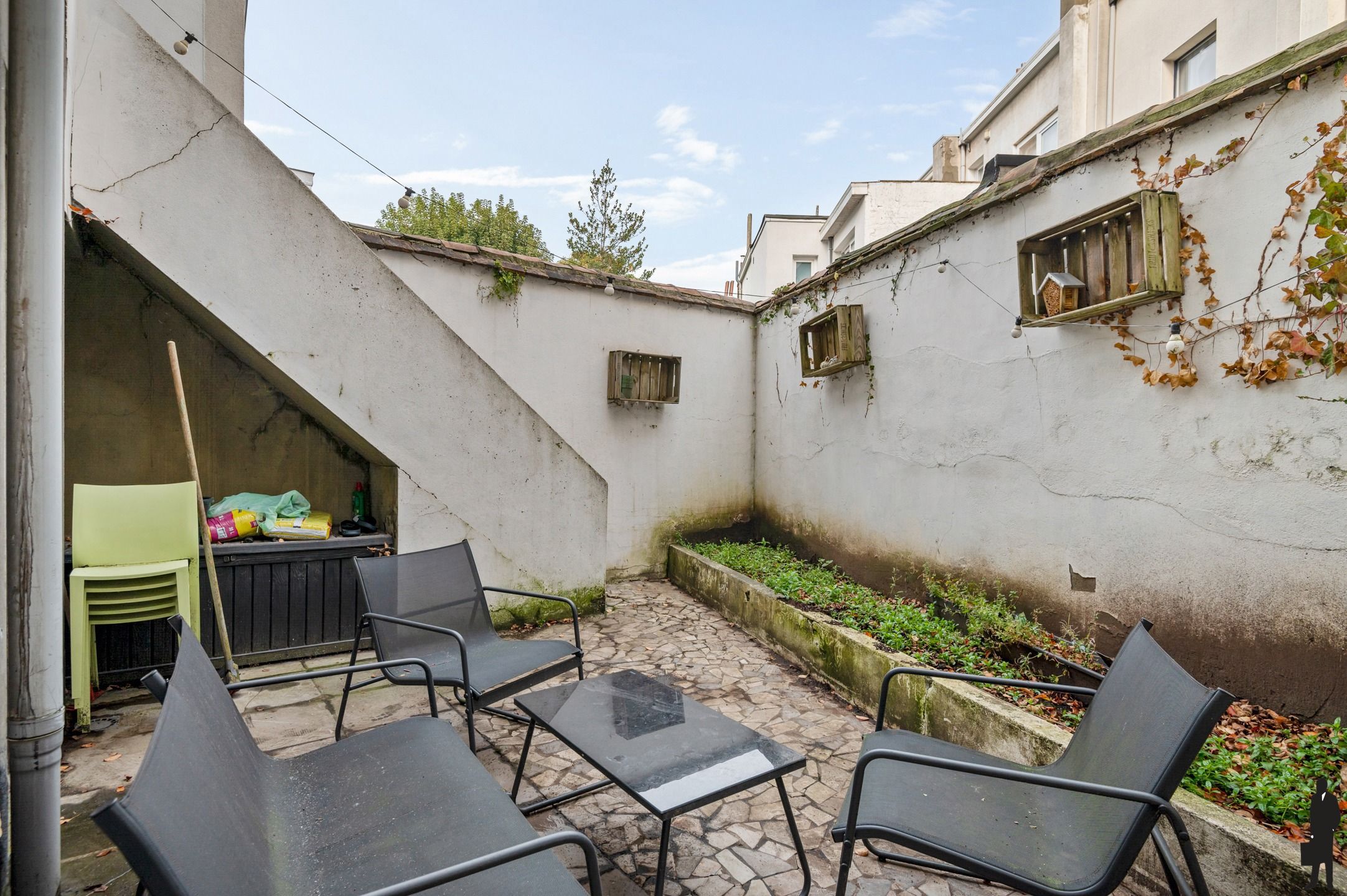 Lichtrijke duplex met tuin in Zurenborg foto 19