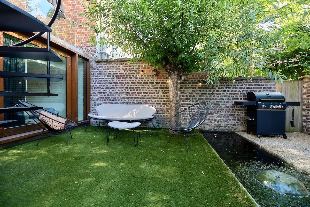 Buitengewone interbellum architecten-burgerwoning met tuin die omgevormd werd tot een hedendaagse luxueuze concept-woning. foto 40