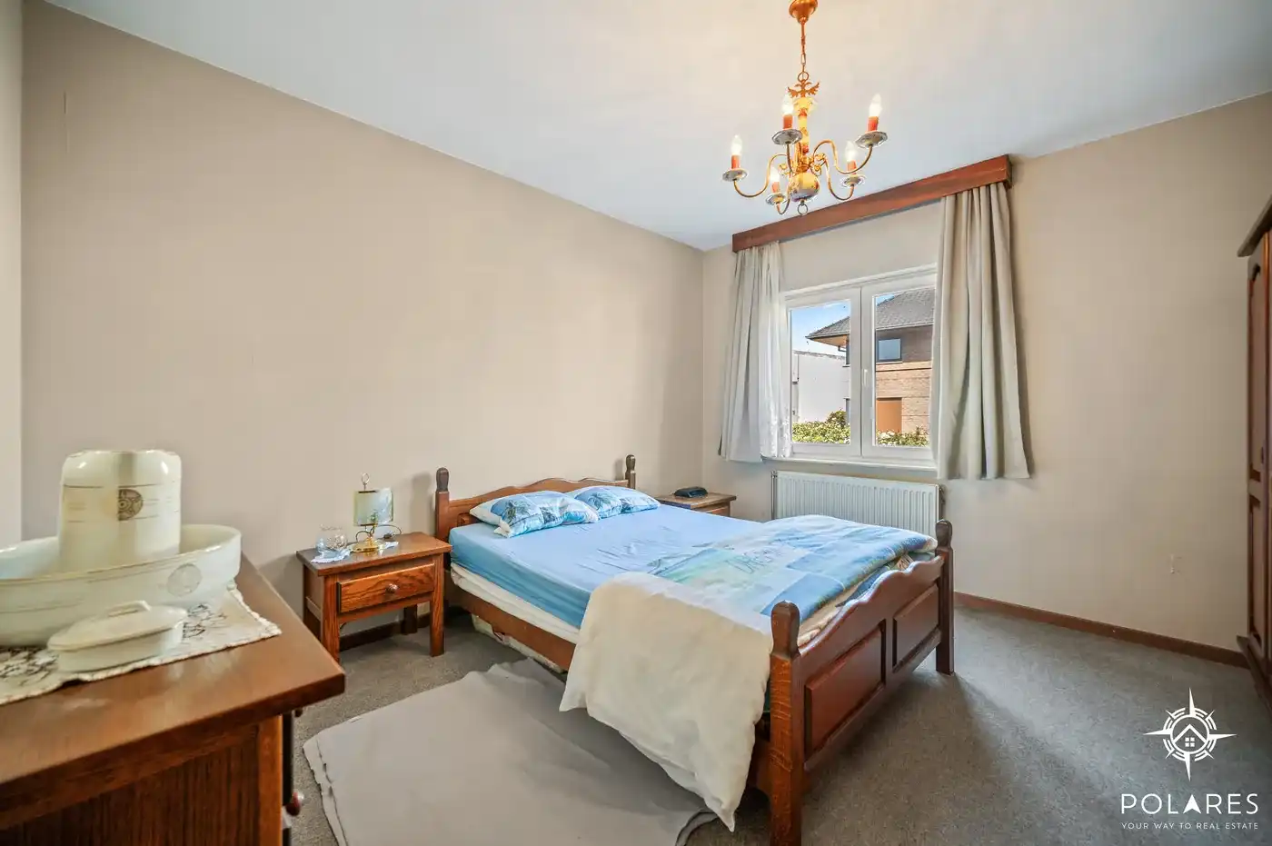 Ruim gelijkvloers appartement met 2 slaapkamers, garage en kelder foto 8
