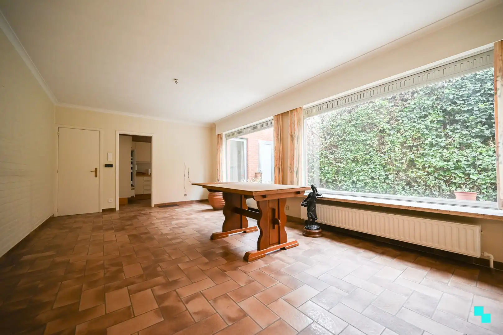 Centraal gelegen handelsruimte met bijhorende woonst en leuke stadstuin te Izegem foto 9