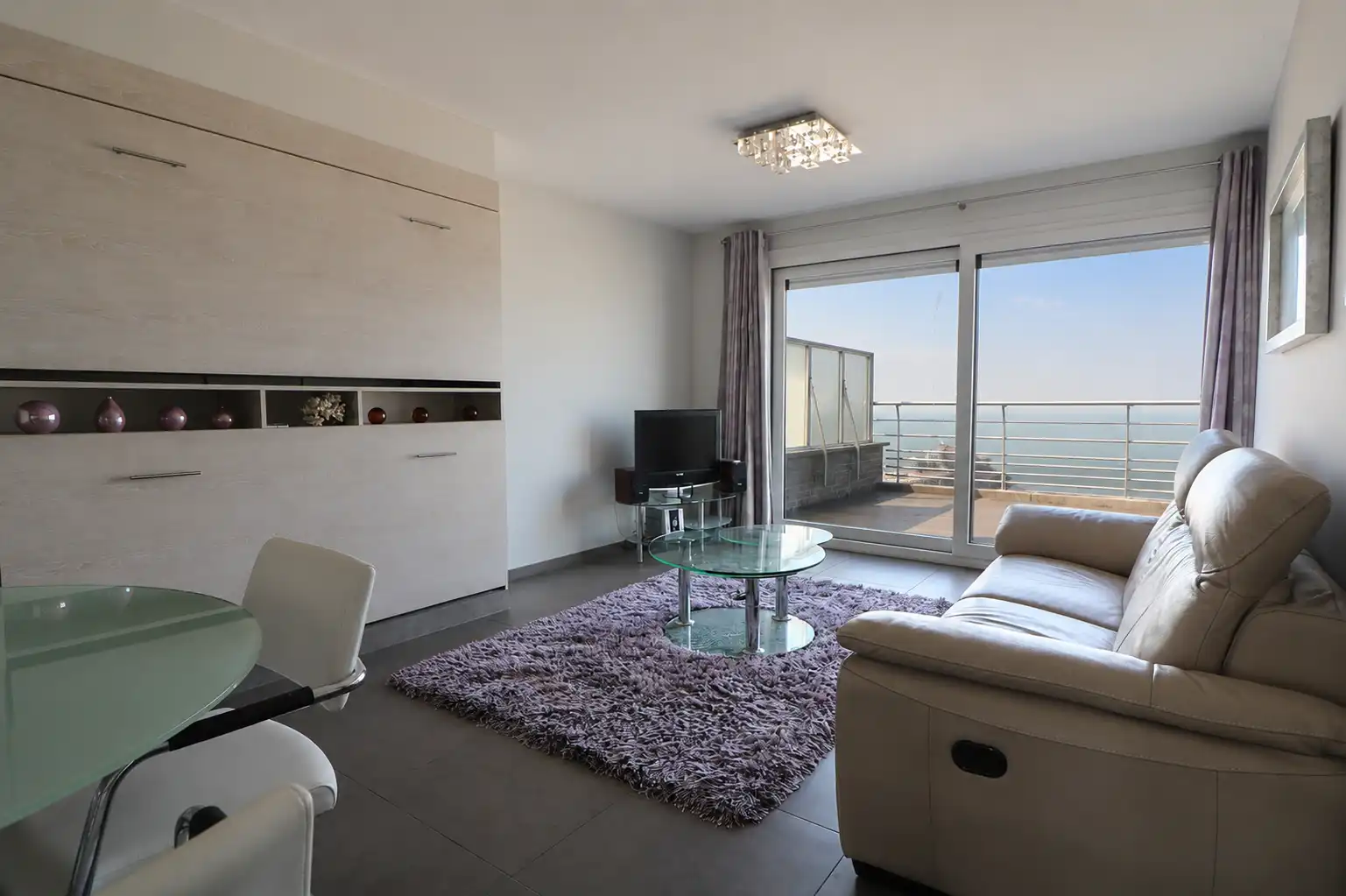 Recent dakappartement met 1 slaapkamer en 2 grote terrassen met prachtige uitzicht op zee, pier, duinen en hinterland. foto 4