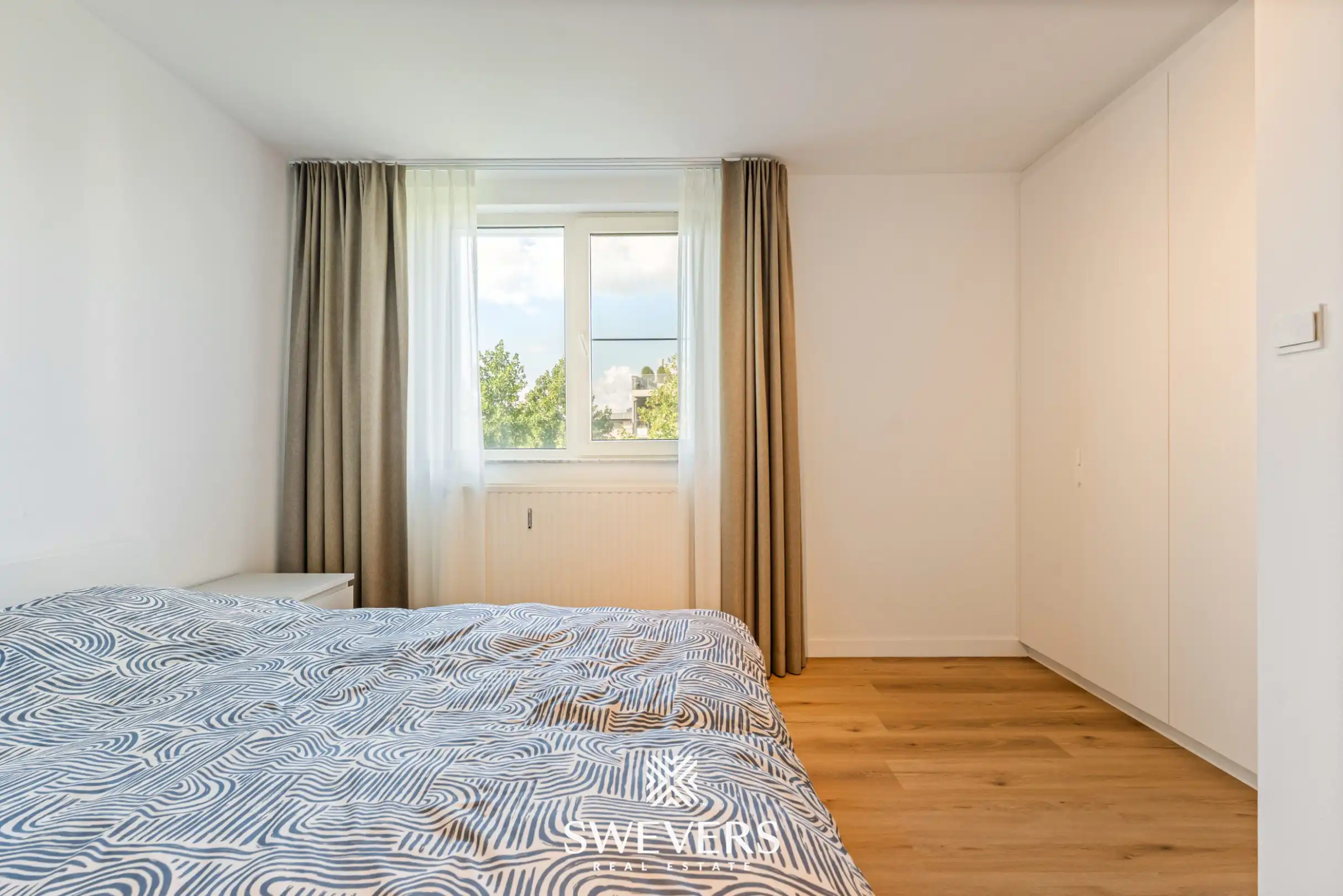 Instapklaar gelijkvloers 3-slaapkamerappartement met autostaanplaats en kelderberging nabij Hasselt-centrum foto 13