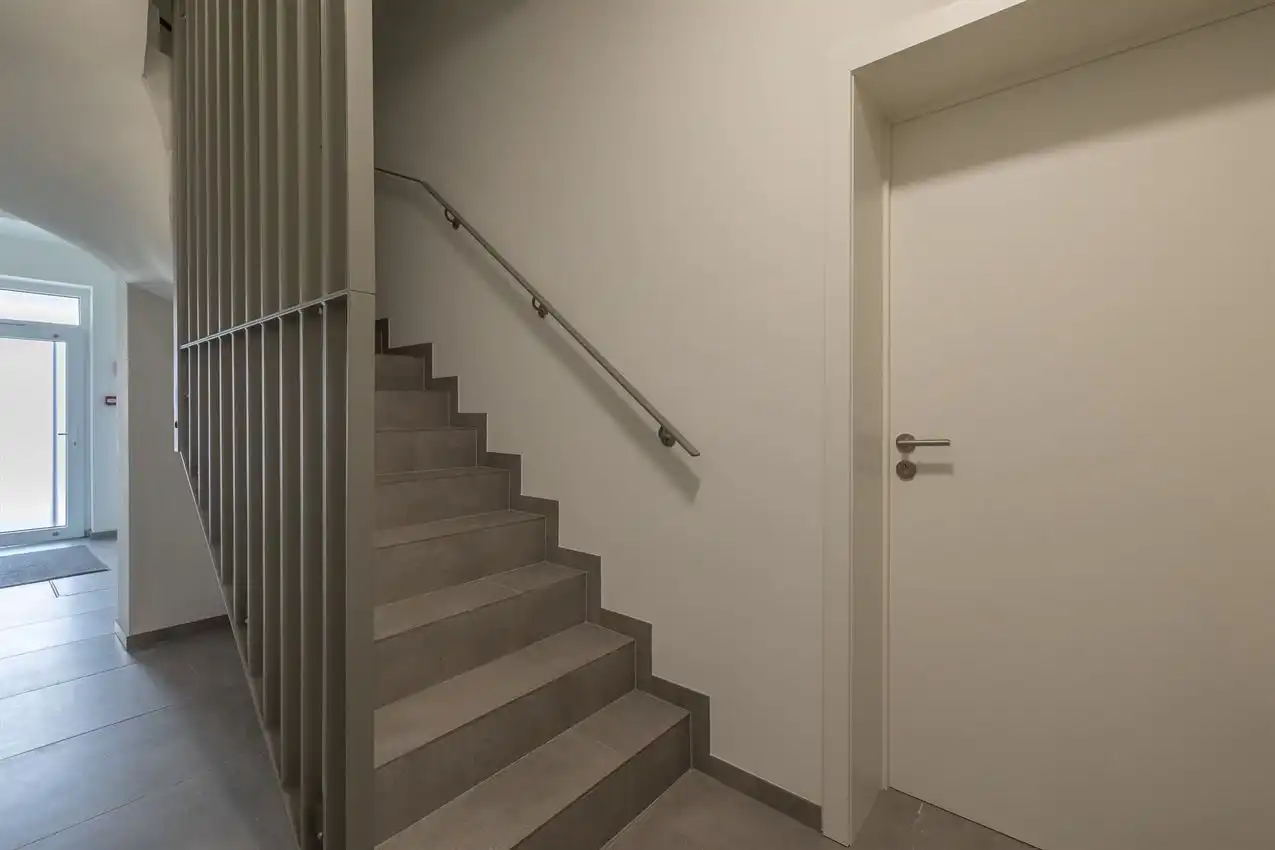 Nieuwbouwappartement met 1 slpk, autostaanplaats en terras foto 19