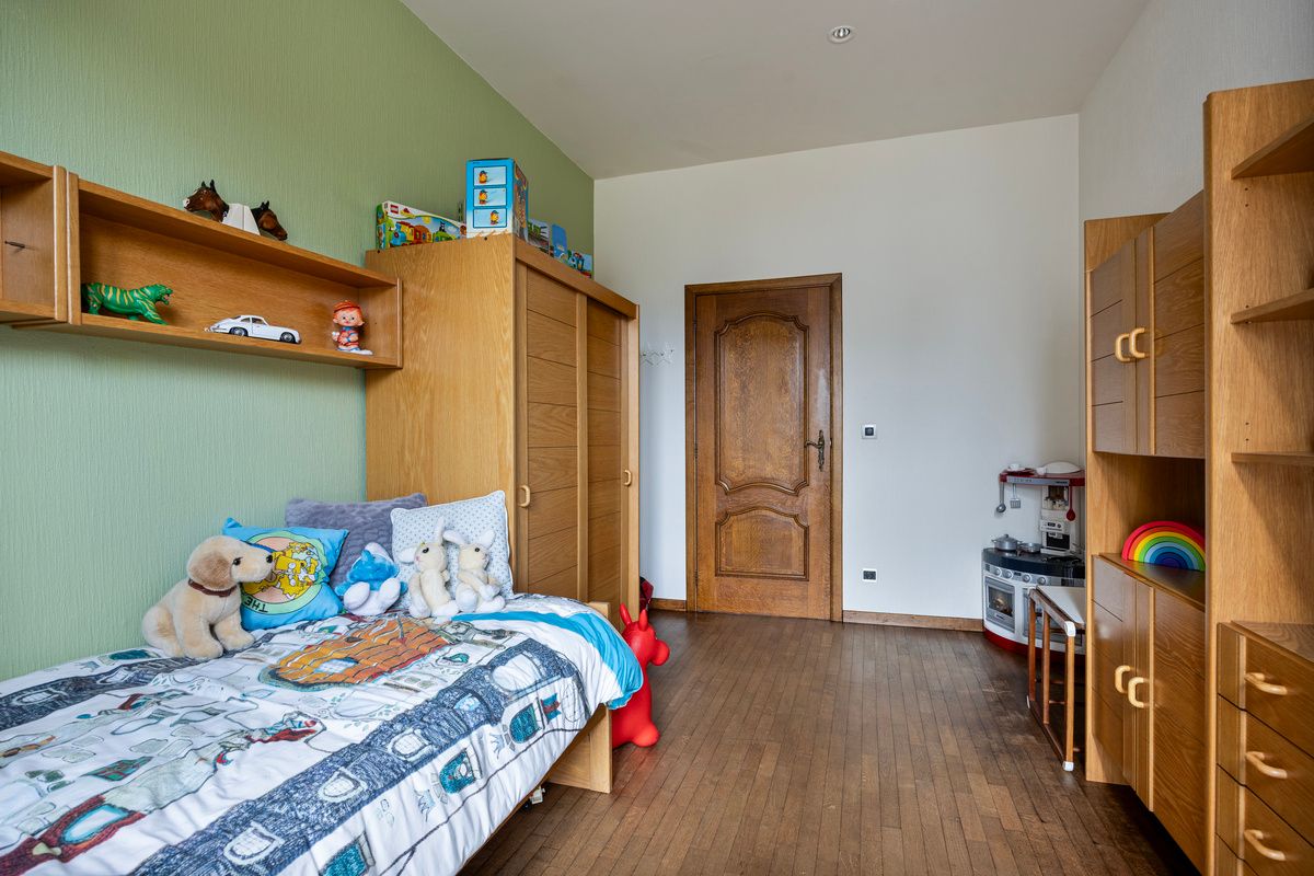 Ruime gelijkvloerse woning met bedrijfshal foto 18
