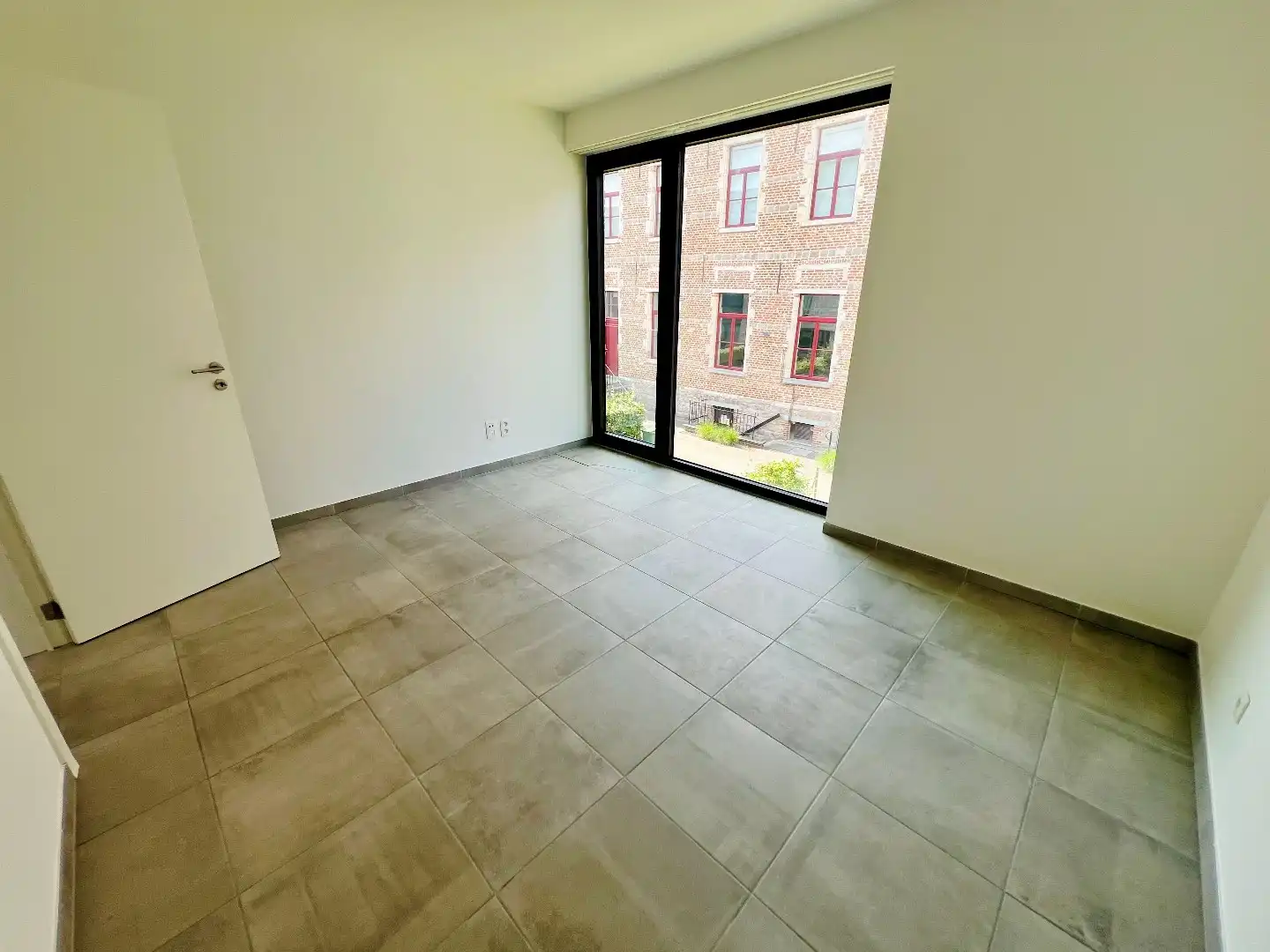 Prachtige rijwoning in centrum met 2 slpks en terras foto 8