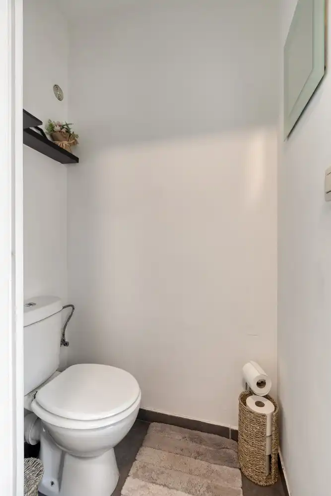 Charmante split-level woning met 3 slaapkamers en ruime tuin in Kotem, Maasmechelen. foto 11