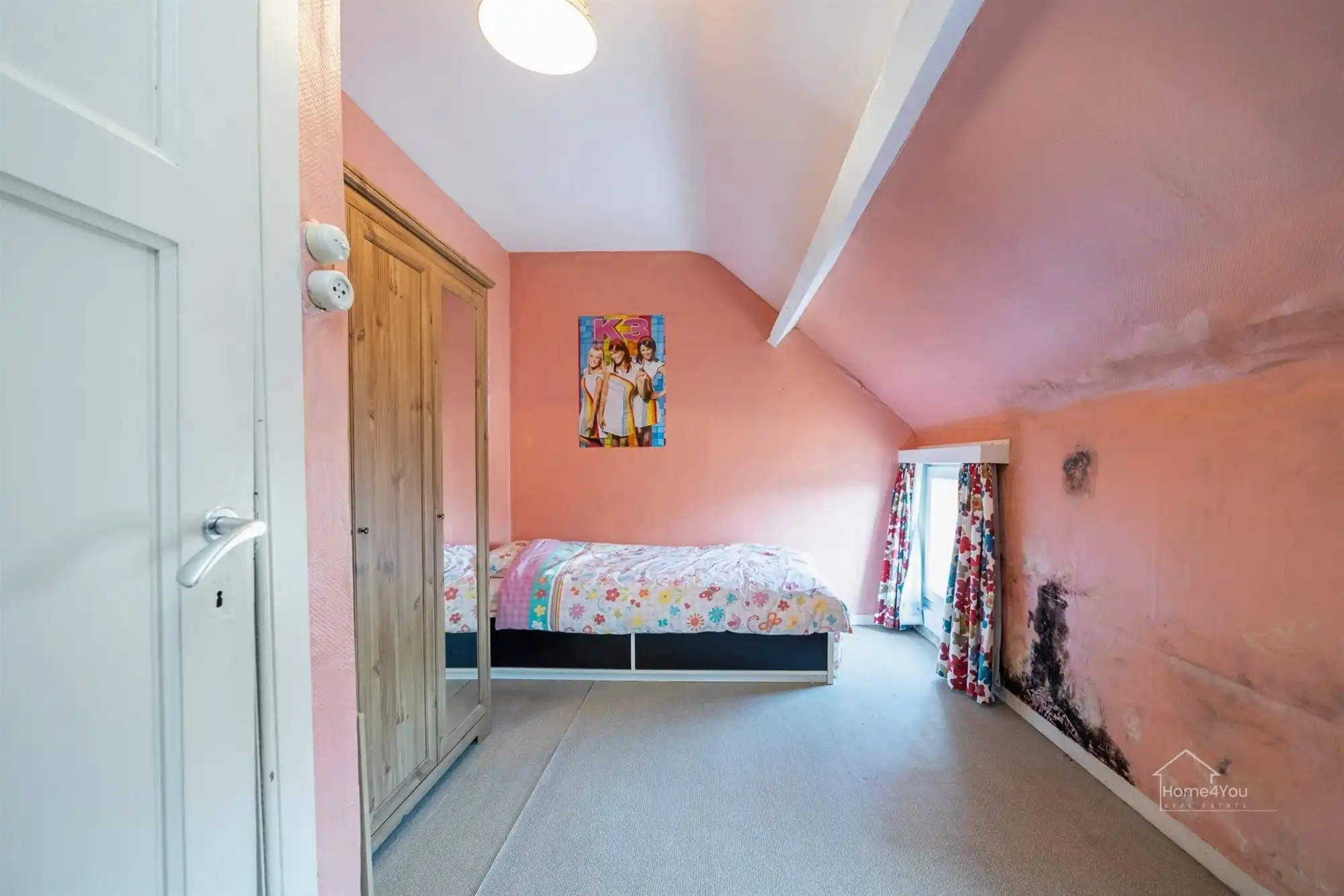 Te renoveren rijwoning met tuintje foto 9