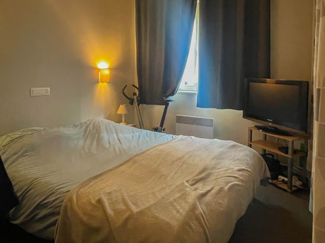 2 slaapkamer appartement met tuin + kelder + Garage foto 8