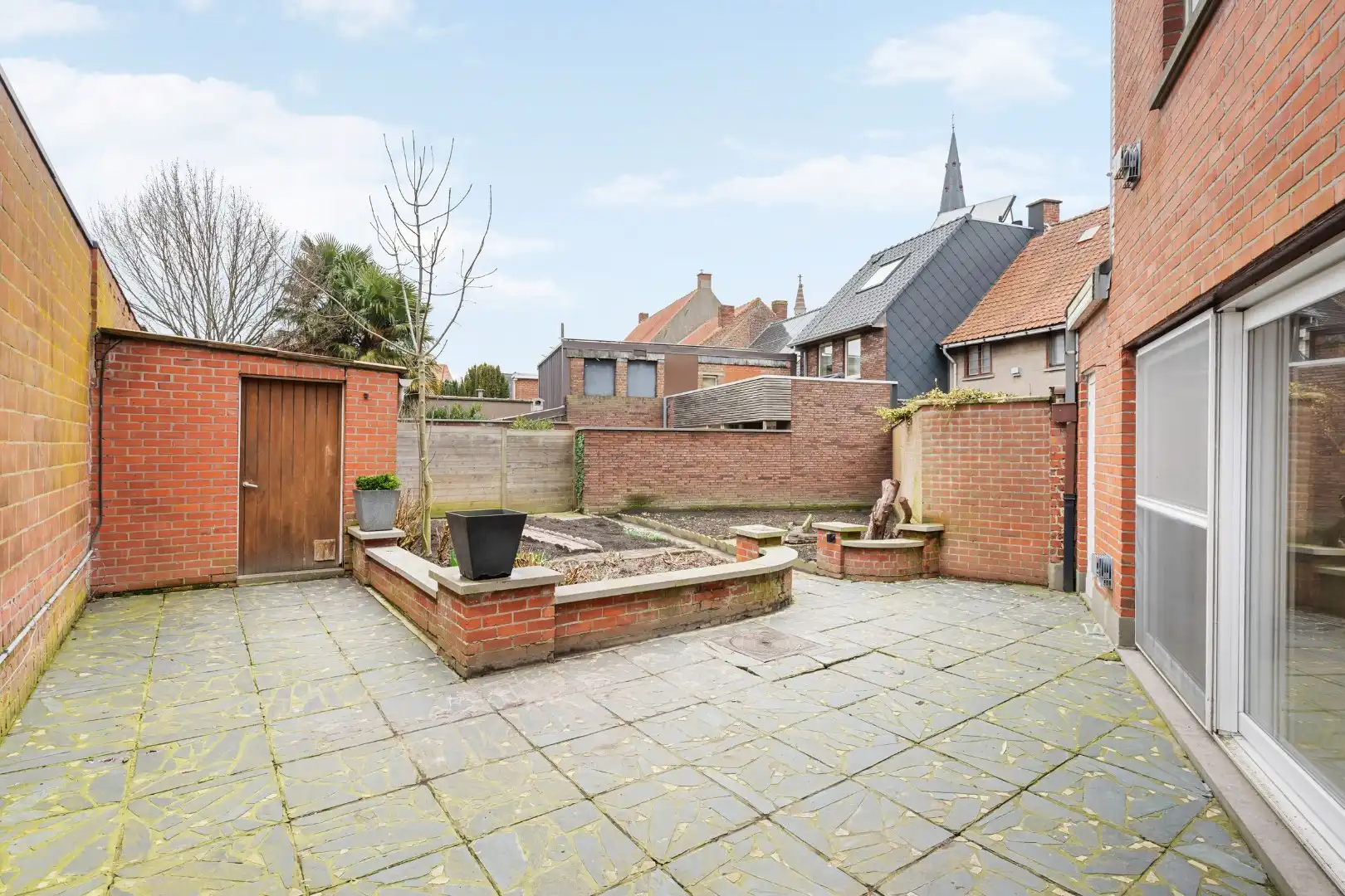 Woning met 3 slaapkamers, zolder, garage en tuin in het centrum van Dadizele foto 8