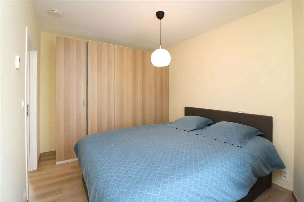 Gelijkvloers app., twee slaapkamers, autostaanplaats nabij centrum foto 21