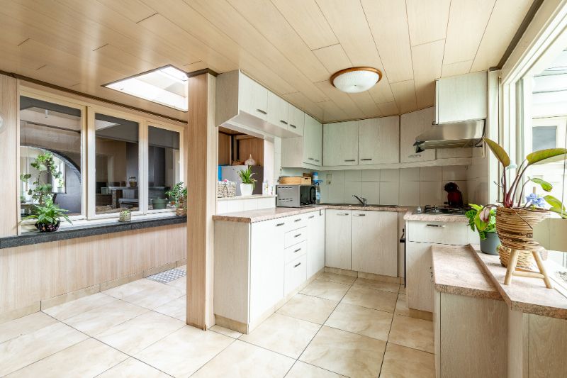 Halfopen woning met 3 slpks en garage foto 7