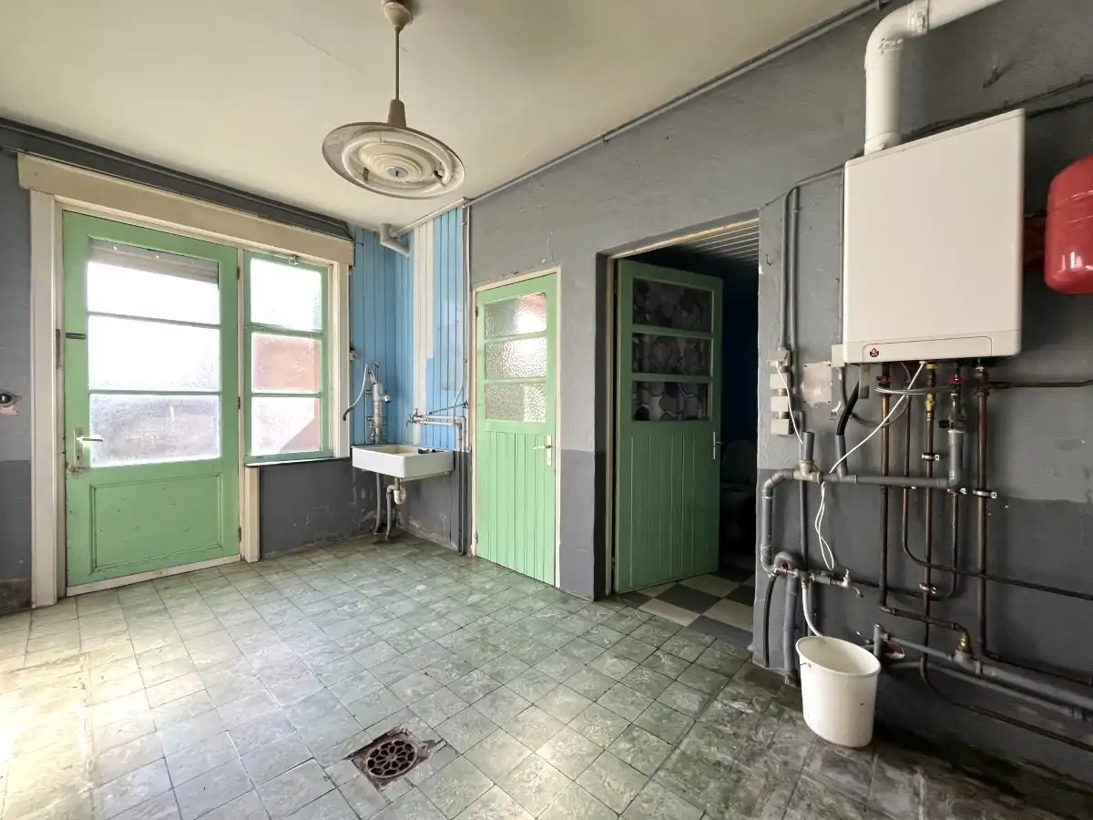 Moorslede – Halfopen woning met veel potentieel foto 10