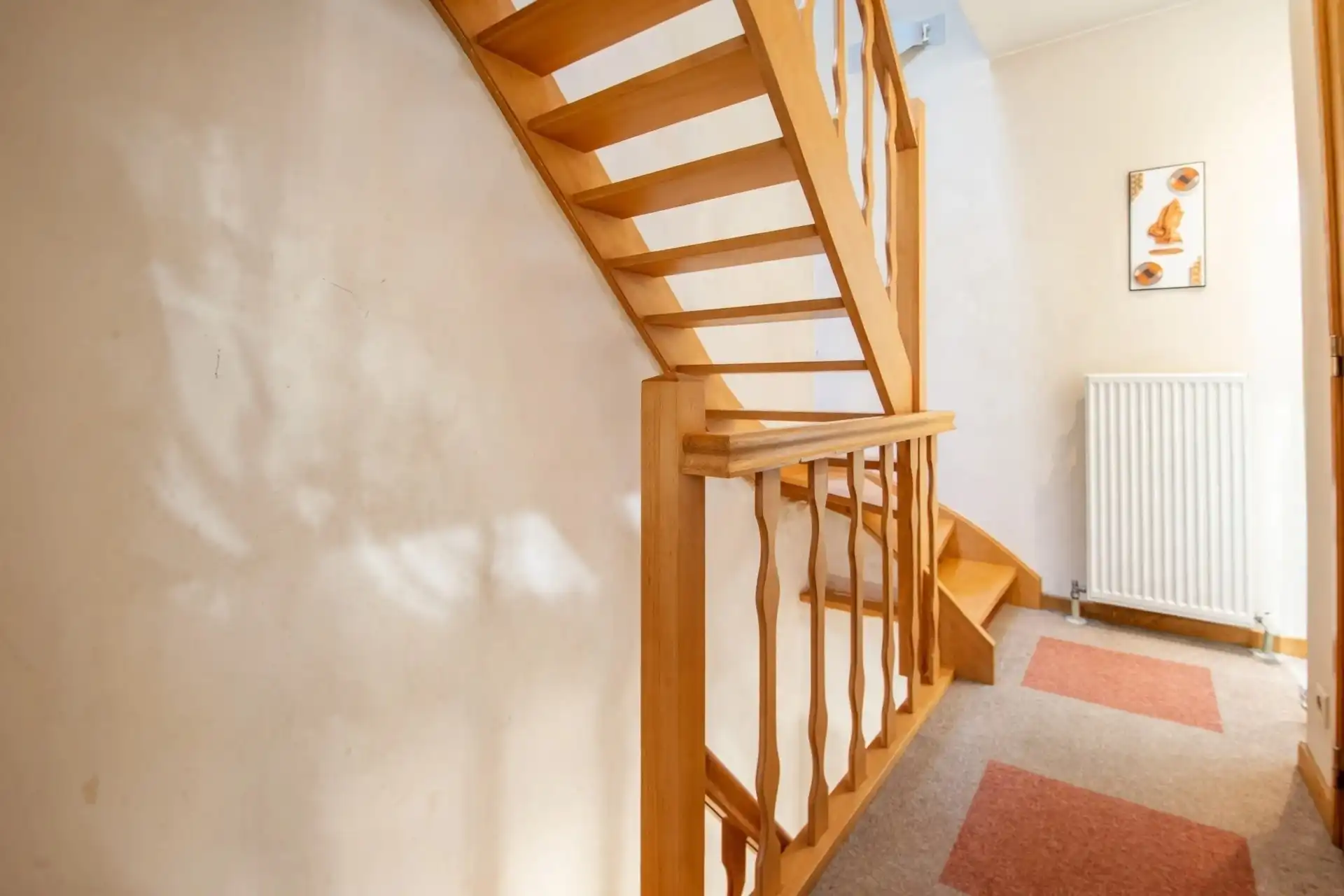Instapklare bel-etagewoning met 2 slaapkamers en een ruime garage in het centrum van Sint-Gillis-Waas foto 8