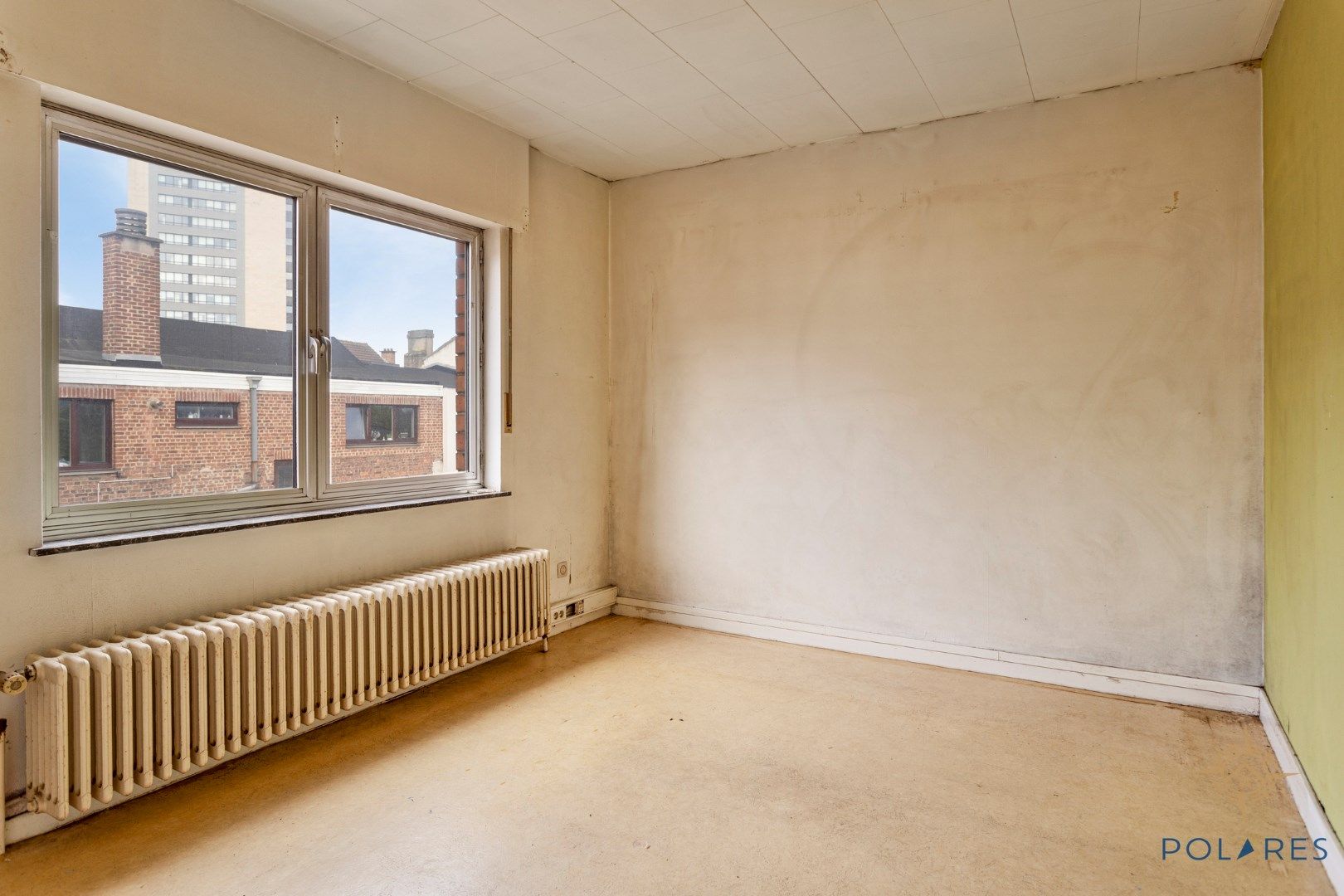 Te renoveren appartement aan de kop van Kessel-Lo foto 12