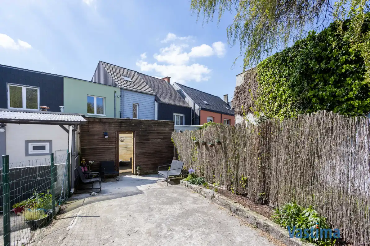 Energiezuinige en instapklare starterswoning met 2 slaapkamers in hartje Erembodegem foto 18