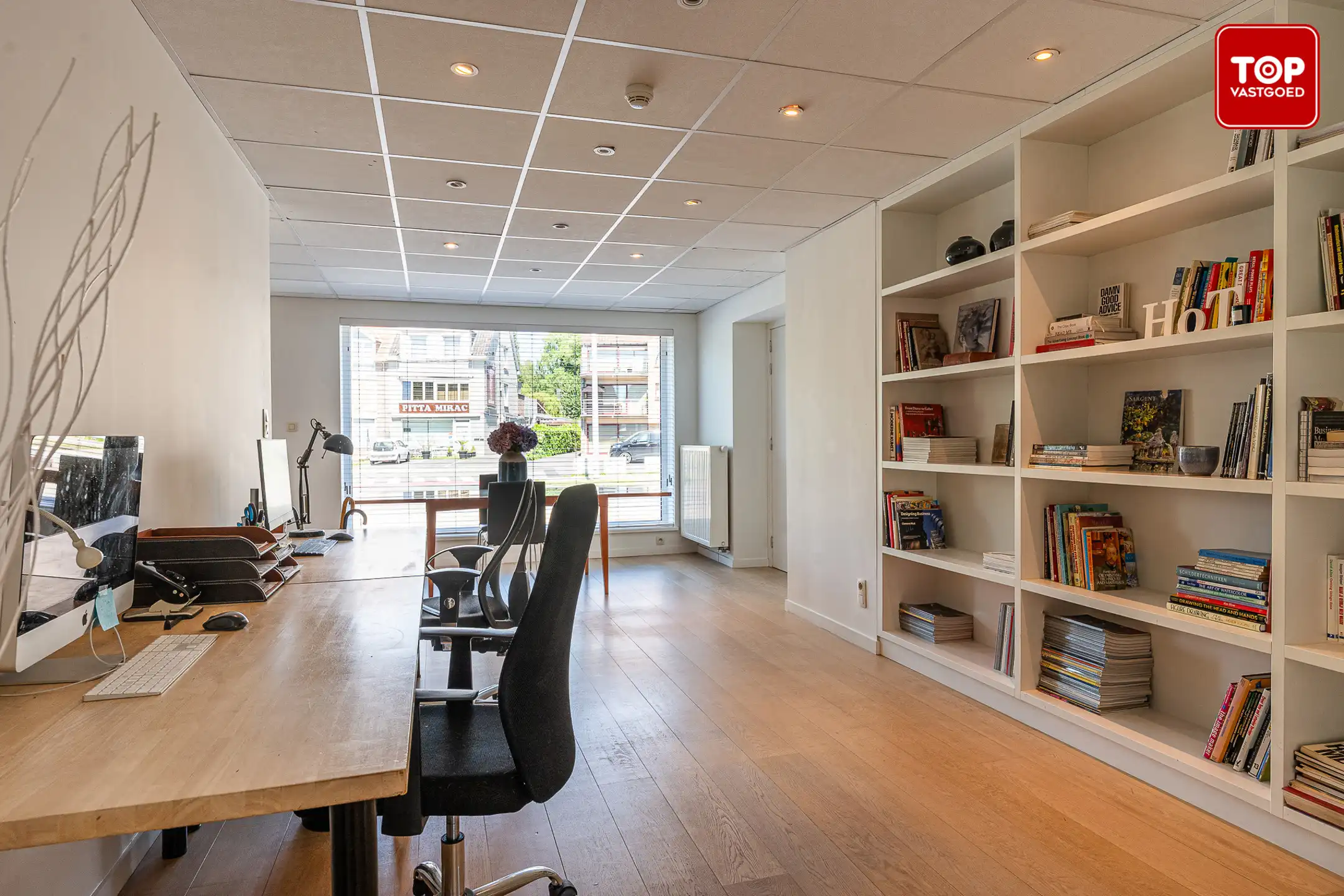 Instapklare combinatie van handelsgelijkvloers en bel-etagewoning op een uiterst gunstige locatie. foto 2