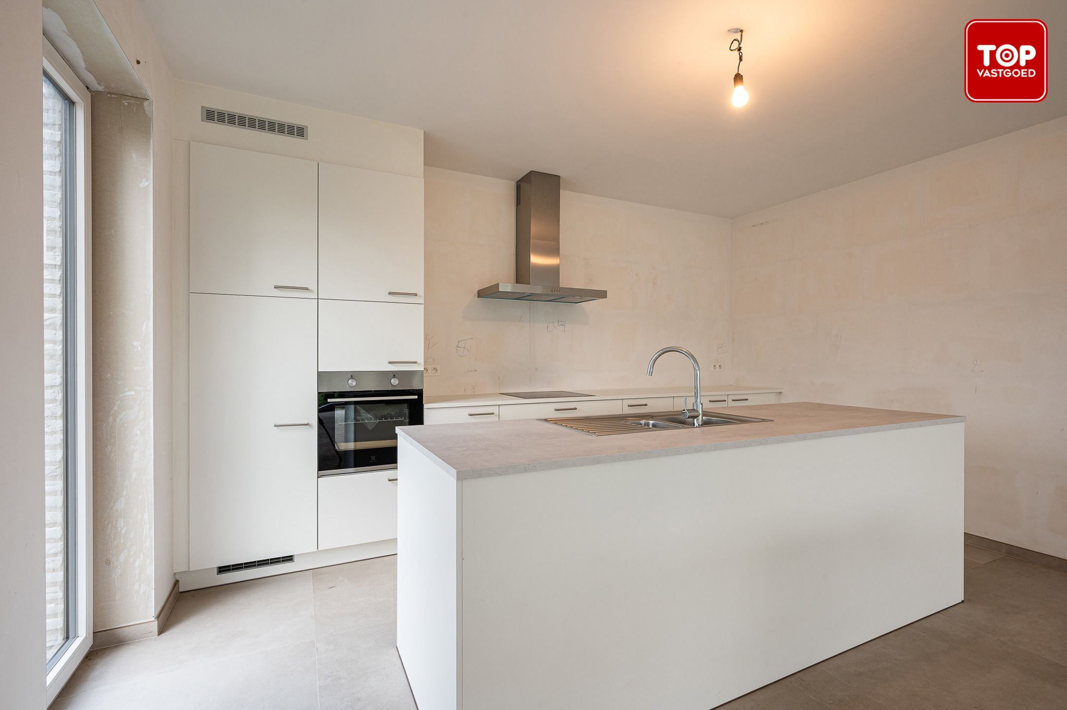 Ruim en lichtrijk nieuwbouwappartement met tuin foto 8