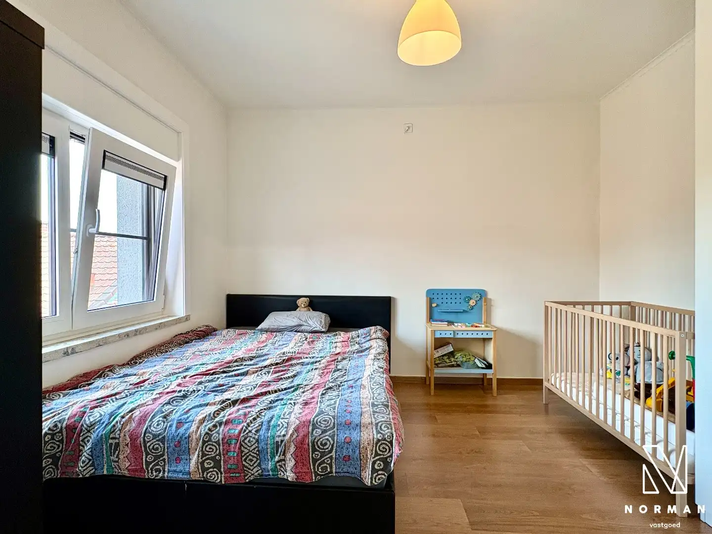 Instapklare woning te koop in rustige woonwijk te Bavikhove met tuin, garage en uitweg! foto 11