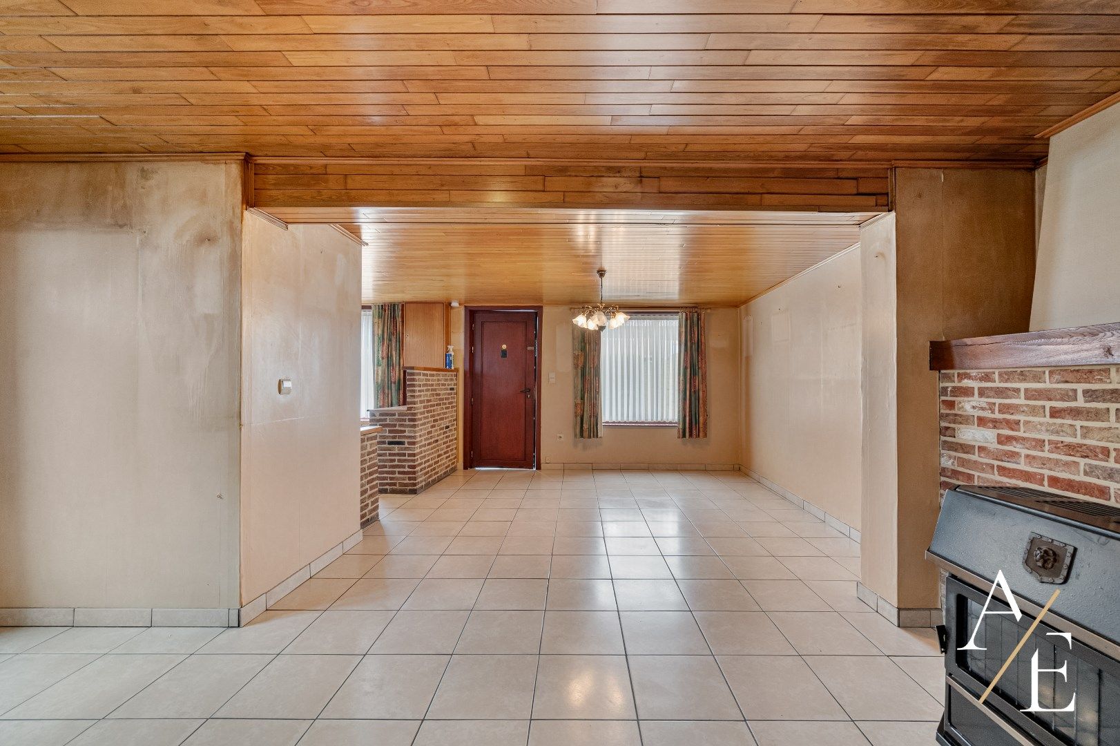 BERLARE - Te renoveren woning met tuin/parking/garage. foto 3
