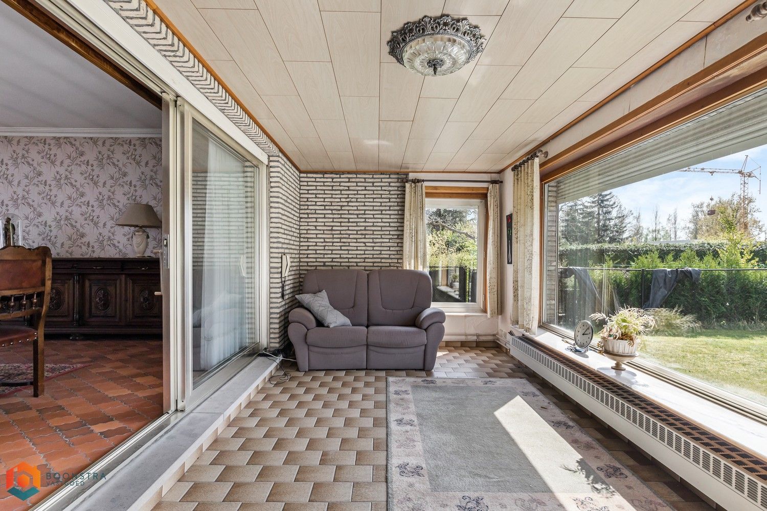 Te renoveren woning met 3 slpkrs op een ruim perceel foto 7