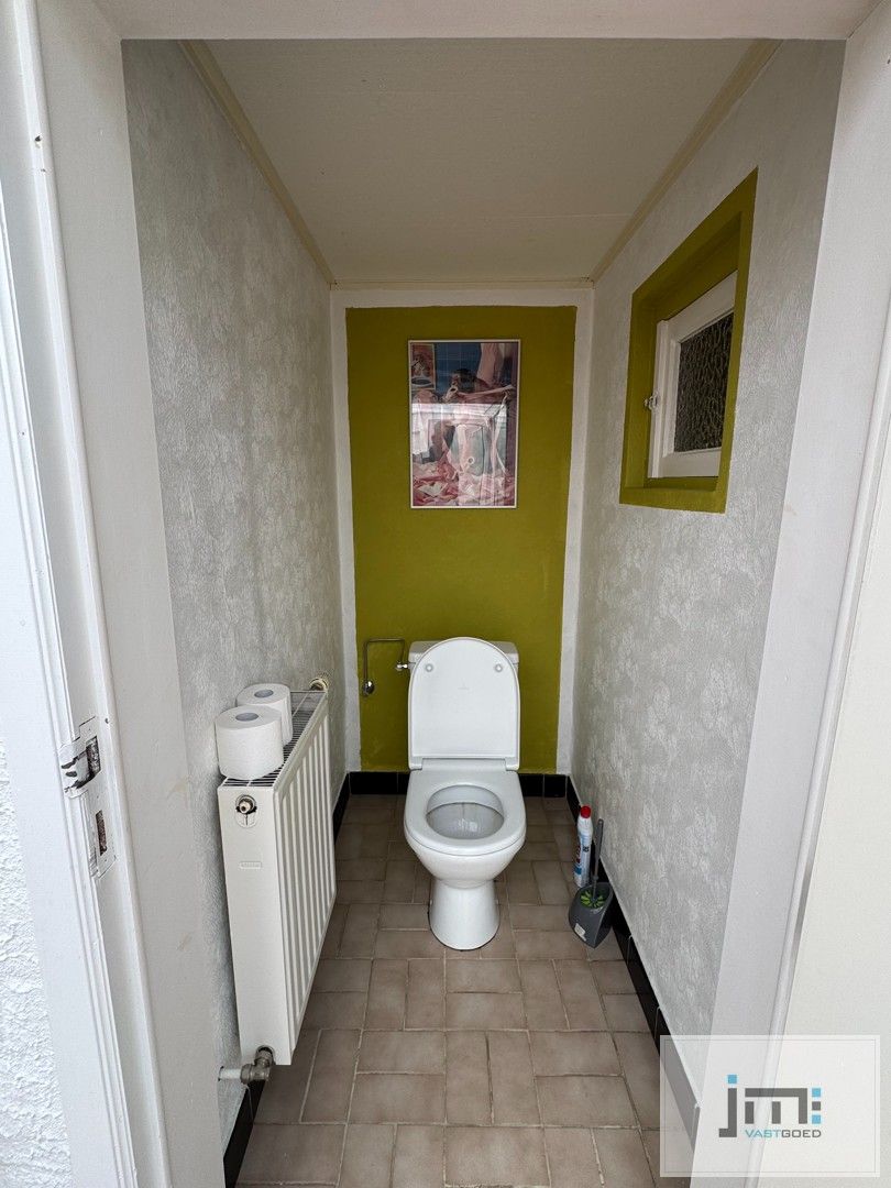Goed onderhouden woning met ruime tuin foto 8