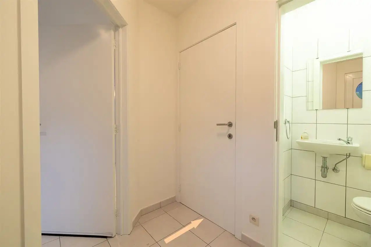 Stadswoning met vier slpk, garage te midden van centrum foto 26