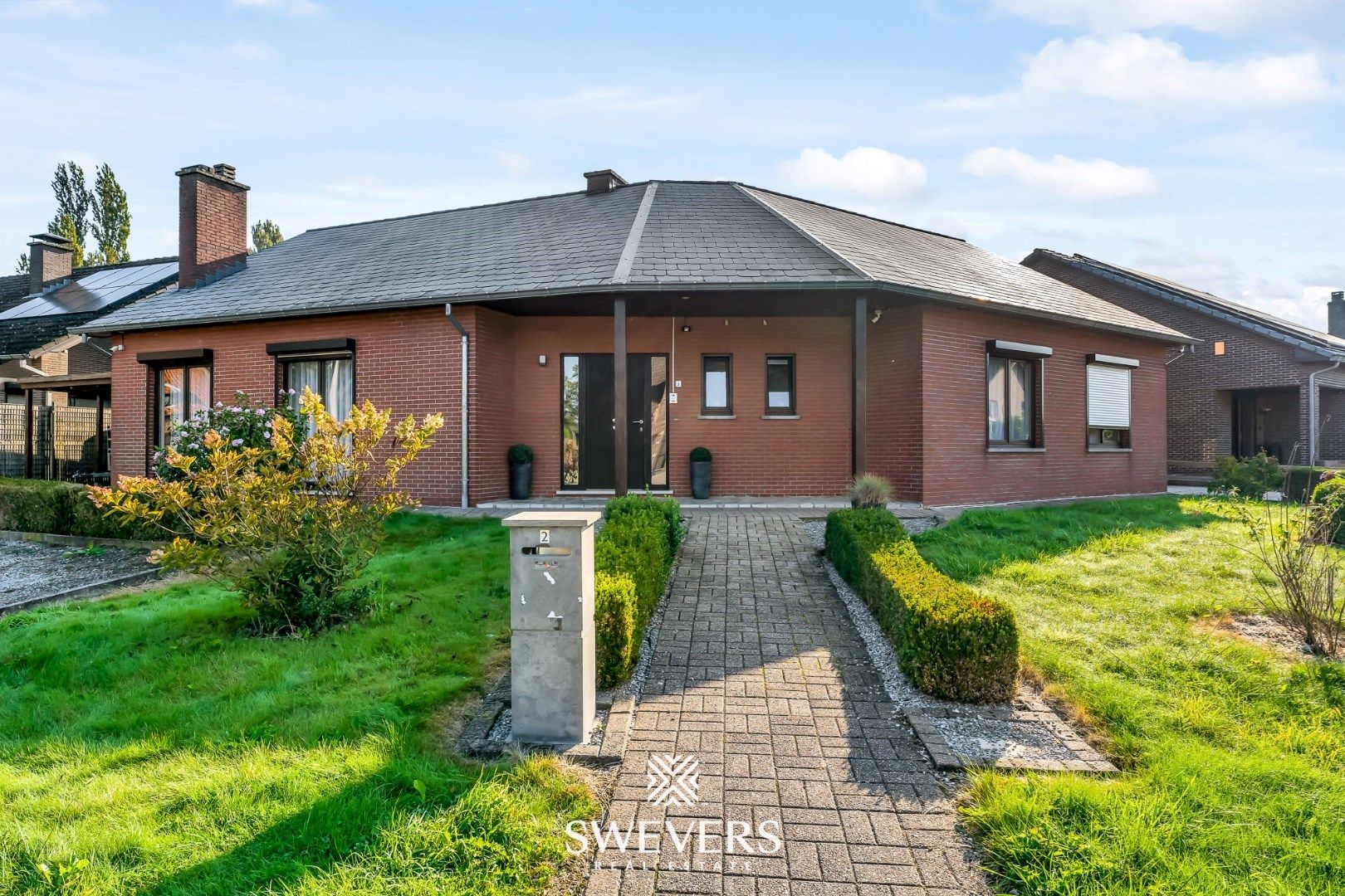 Hoofdfoto van de publicatie: Instapklare gelijkvloerse woning met 4 slaapkamers en gezellige tuin in Borgloon