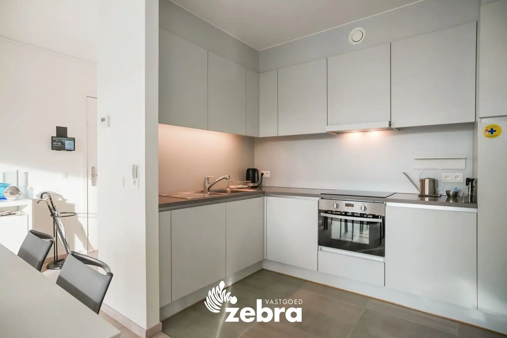 Moderne serviceflat met prachtig zicht op de Leie en autostaanplaats te Deinze! foto 5