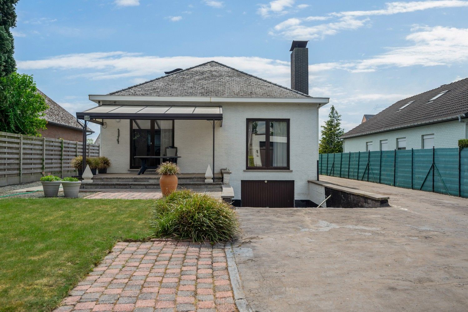 Ruime woning met prachtig onderhouden tuin met verzicht over de velden foto 28